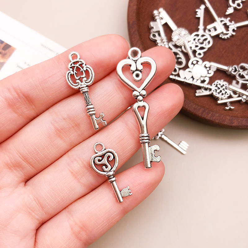 50g/pack Key Charms Bracelets  - Jewelry Making Business reseña y precio